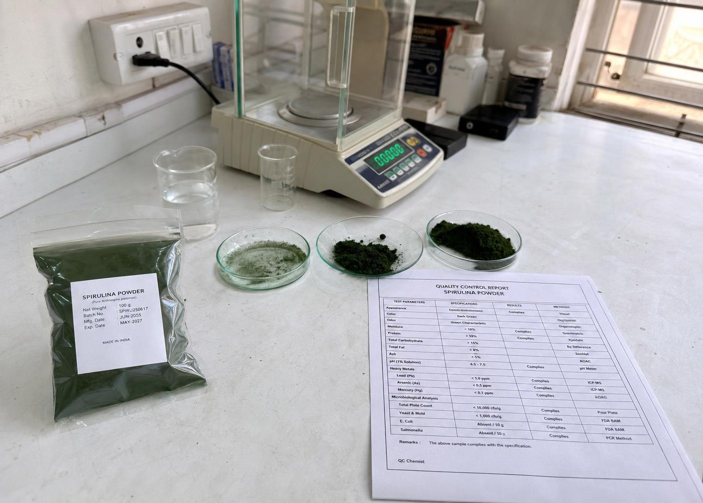 Lab technician testing a spirulina powder sample